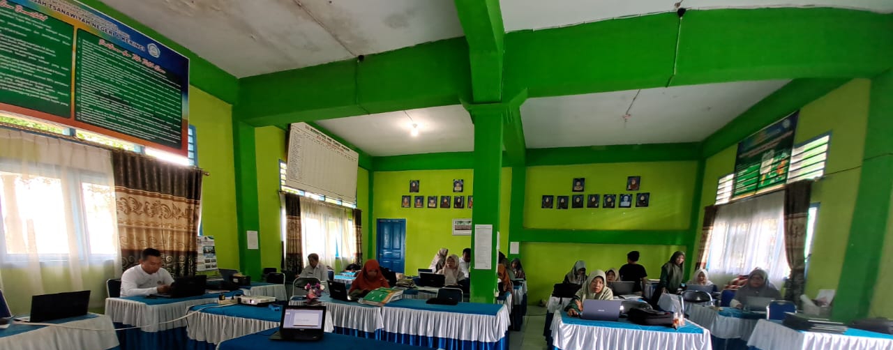 Majlis Guru MTsN 6 Kerinci Antusias Laksanakan Pengisian Rapor Digital Madrasah [RDM Majlis Guru MTsN 6 Kerinci Antusias Laksanakan Pengisian Rapor Digital Madrasah [RDM